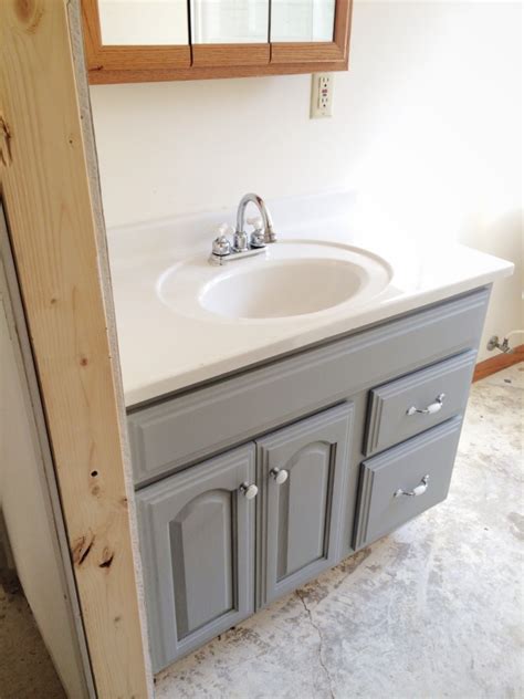 These instructions walk through the process of how to paint your bathroom vanity. Painted Bathroom Vanity - Michigan House Update