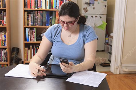 I stumbled across the unofficial checklist for women with aspergers now known as hfa. Woman with Asperger syndrome working - Stock Image - F012/5187 - Science Photo Library