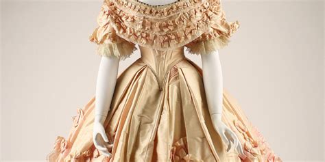 1860s costume accessories, civil war era fashions, vintage victorian. 1860 - Cream silk evening dress | Fashion History Timeline