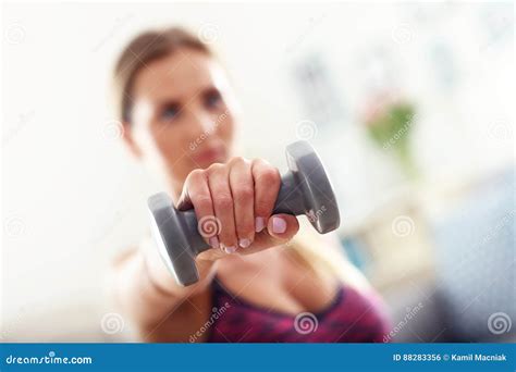 Woman Exercising With Dumbbells At Home Stock Photo Image Of Activity
