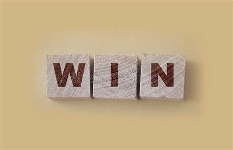 Win Word On Wooden Cubes Achievement Competition And Success Concept