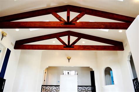 Vaulted ceilings are known, formally and informally, by many names in modern design (such as exposed rafter beams add character. Vaulted ceiling with exposed beam trusses - Mediterranean ...