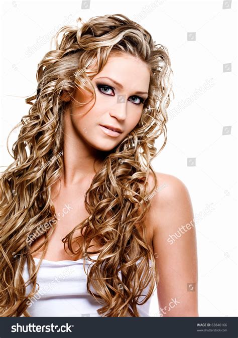Beautiful Woman With Luxury Blond Long Curly Hair Stock Photo 63840166