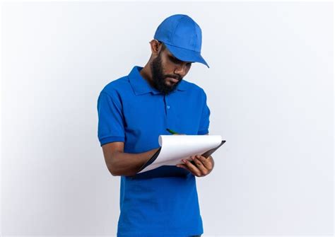 Free Photo Young Afro American Delivery Man Writing Something On