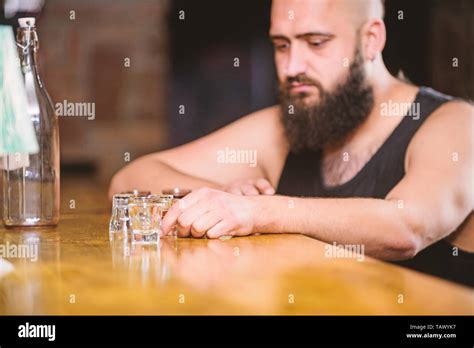 Hipster Brutal Man Drinking Alcohol Ordering More Drinks At Bar Counter