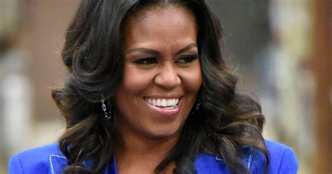 Michelle Obama Rocks Curly Natural Hair On Essence