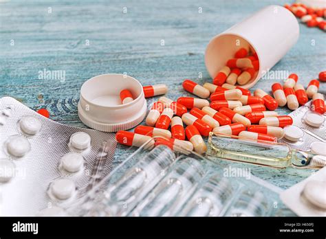 Drug Ampules Prescription For Treatment Medication Heap Of Red Orange