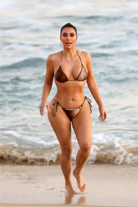 Kim Kardashian Shows Off Her Curves In A Snakeskin Print Bikini After