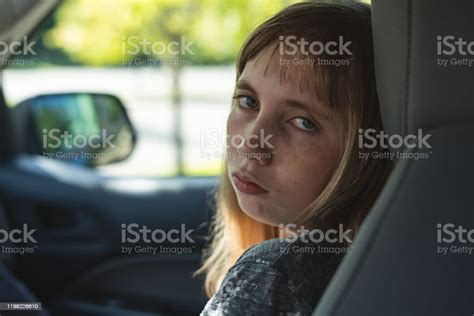 Saddepressed Teen Girl Sitting In A Carsuv While Being Driven Topicked