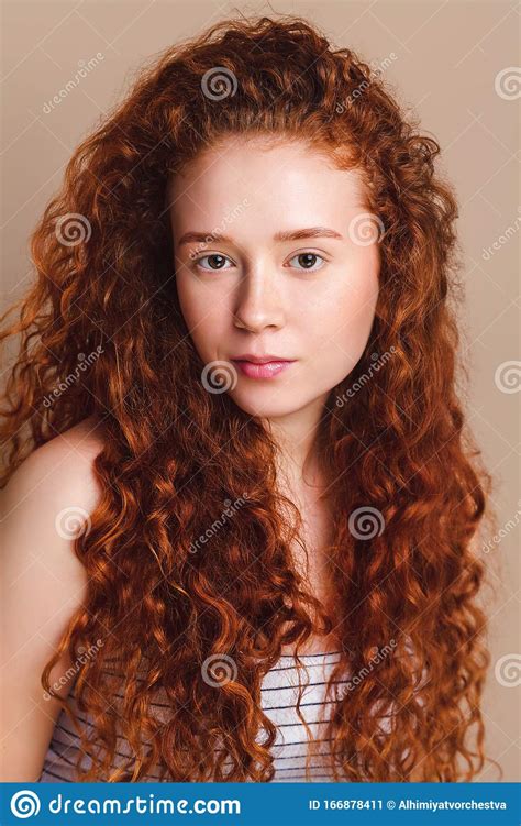 Beautiful Teenage Girl With Red Curly Hair And Brown Eyes