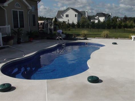 So what is stamped concrete? Riviera 34 with brushed concrete | Fiberglass swimming ...