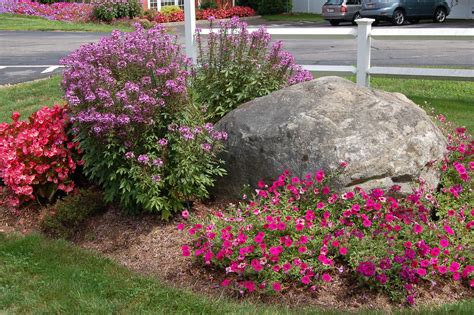 May 26, 2020 · how to use rocks in your landscape natural stone is one of the most versatile elements available for a landscape makeover. #bellgardens | Hardscape, Landscaping with boulders ...