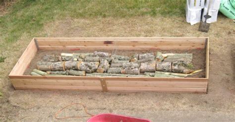 2.) yes, you can apply grubex to the flower bed. Logs in Raised Garden Bed « Inhabitat - Green Design ...