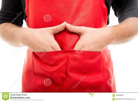 Close Up Of Supermarket Employer With Hands In Pockets Stock Photo
