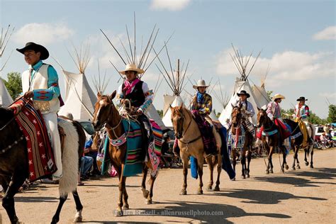 Indian Cowboys In Crow Fair Parade On Crow Indian Reservation In