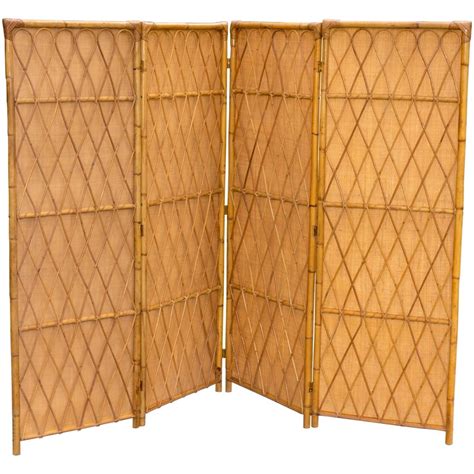 Four Panel Rattan Screen With Inserted Woven Grass Panels For Privacy
