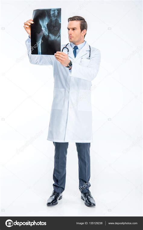 Doctor Looking At X Ray Stock Photo By ©igortishenko 135129238