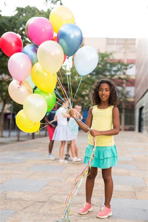 Full Length Portrait Of Happy African American Preteen Girl With