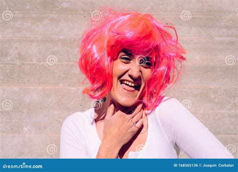 Ugly Woman In National Dress Posing In A Rustic Interior Stock Image