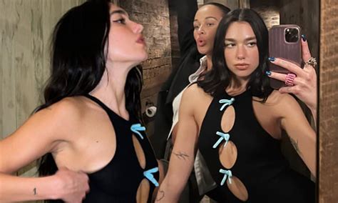 Dua Lipa Looks Sensational In A Skintight Cut Out Jumpsuit As She Poses