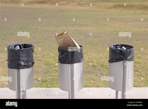 Three Trash Cans Hi Res Stock Photography And Images Alamy