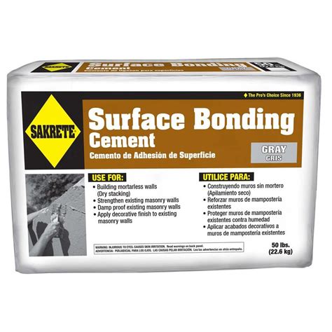 Cinder blocks lie on the ground and dried. SAKRETE 50 lb. Surface Bonding Cement in Gray-65300845 ...