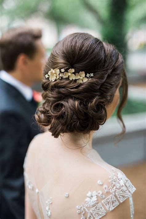 Elegant Curled Updo With Gilded Floral Hairpiece Elegant Wedding Hair