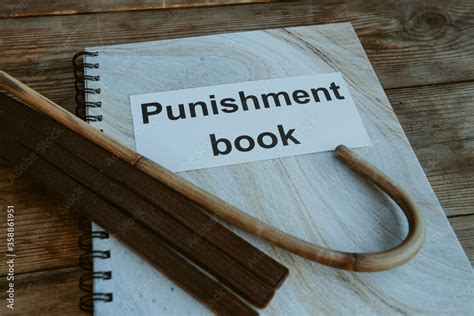 Punishment Book Leather Tawse And Cane For Spanking On Headmasters Or Teachers Desk School