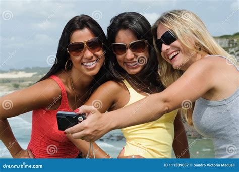 Three Beautiful Women Taking Selfie On The Beach Stock Image Image Of