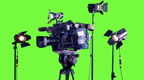 Professional studio spotlights and a professional video camera on a green screen. Stock Video Footage - Storyblocks