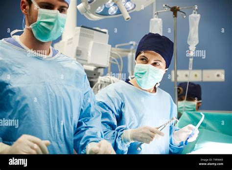 Surgeons Working Together While Operation Stock Photo Alamy