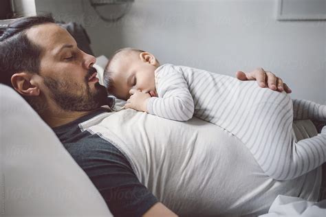 Baby Sleeping On Fathers Chest By Stocksy Contributor Lumina Stocksy