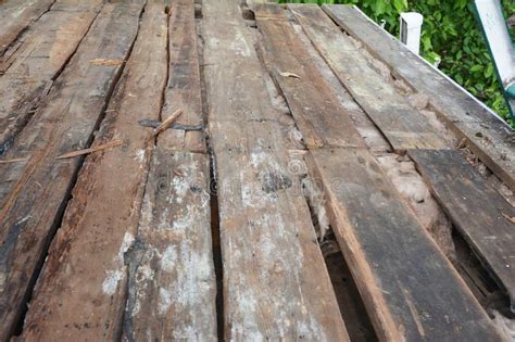 Old House Roof With Bad Wet Wooden Beams And Wet Rock Wool Insulation