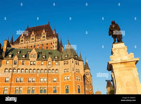 Canada Quebec Quebec City Old Architecture With Statue Stock Photo