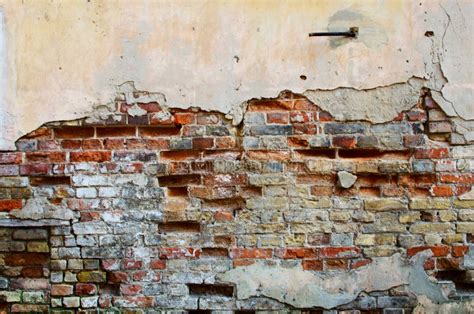 Brick Wall With Cracked Plaster Stock Photo Image Of Cracked Grunge