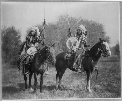 Two Sioux Native Americans Holding Spears On Horseback Taken Around