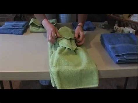 There are a number of ways to display towels that will go a long way toward improving the look of your towel rack. How to Tie Towels to Impress Your Clients - YouTube