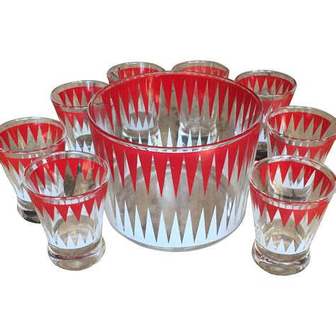 A Set Of Six Red And White Glass Bowls