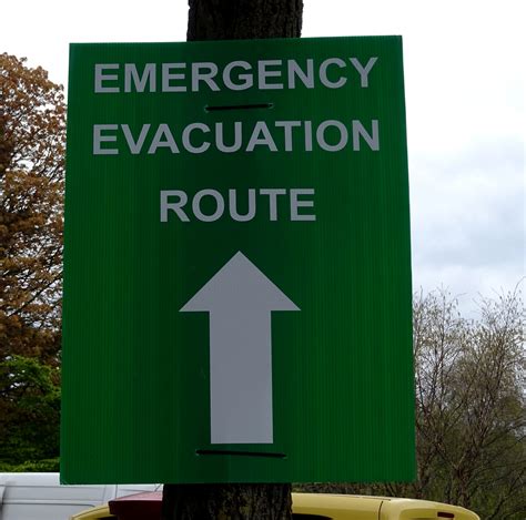 Emergency Evacuation Route Signpost Free Stock Photo Public Domain