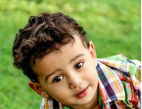 His toddler boy haircut was short and trimmed, using only scissors to keep is curls natural. Baby Boy Haircuts For Curly Hair … | Pinteres…