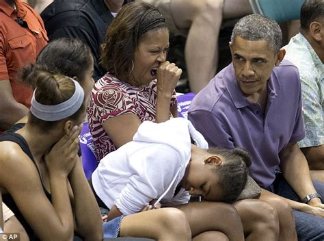 Hopefully the ball sinks into the net without bouncing out. President Obama takes First Family to college basketball ...
