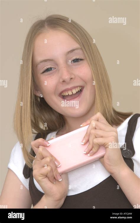 Young Girl Holding Nintendo Ds Hi Res Stock Photography And Images Alamy