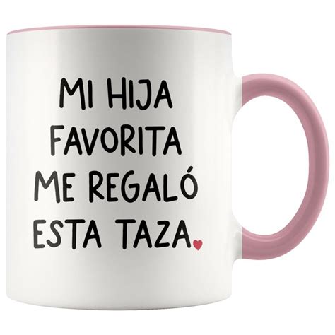 A Pink And White Coffee Mug With The Words Mi Hida Favorita Me Regalo