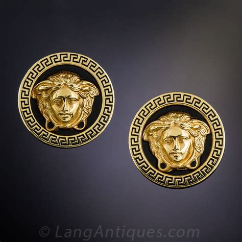 By The Late Great Fashion Designer A Pair Of Iconic Versace Medusas