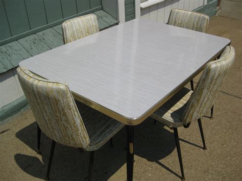 If your kitchen has room for furniture, like a small dinette set or a storage piece, choose vintage. 1950's retro kitchen table chairs - Bringing Back Classic ...