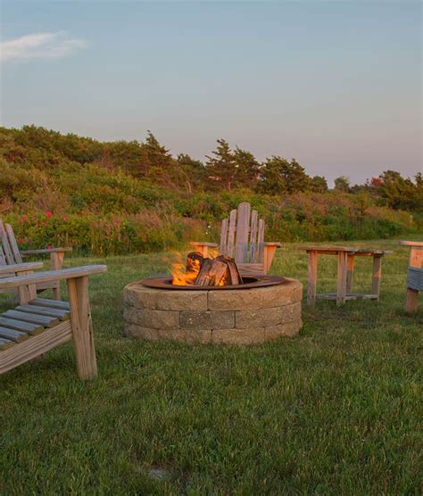 The flame of a bonfire will heat you and your wilderness dwelling and is a must for cooking. Smokeless Fire Pit Ring | Wood Burning Fire Pit ...