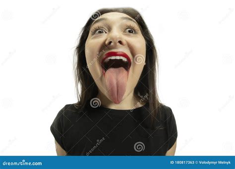smiling girl opening her mouth with red lips and showing the long big giant tongue isolated on