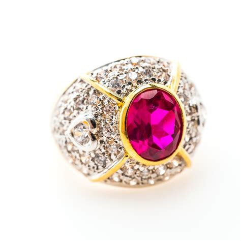Luxurious Golden Ring With Purple Gemstone Photo Free Download