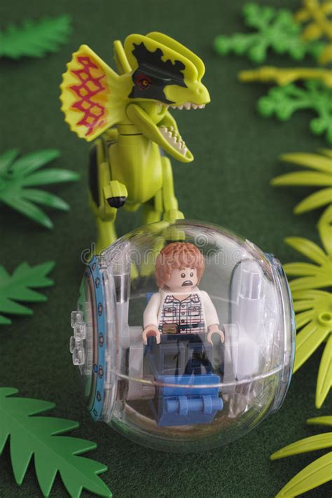 Lego Jurassic Park Gray Minifigure In Gyrosphere And Dilophosaurus Editorial Image Image Of