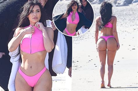 kim kardashian bares all her booty in a bubblegum pink thong bikini us today news